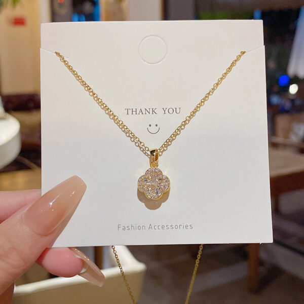 Wholesale Titanium steel zircon-set four-leaf zircon necklace pendant clavicle chain