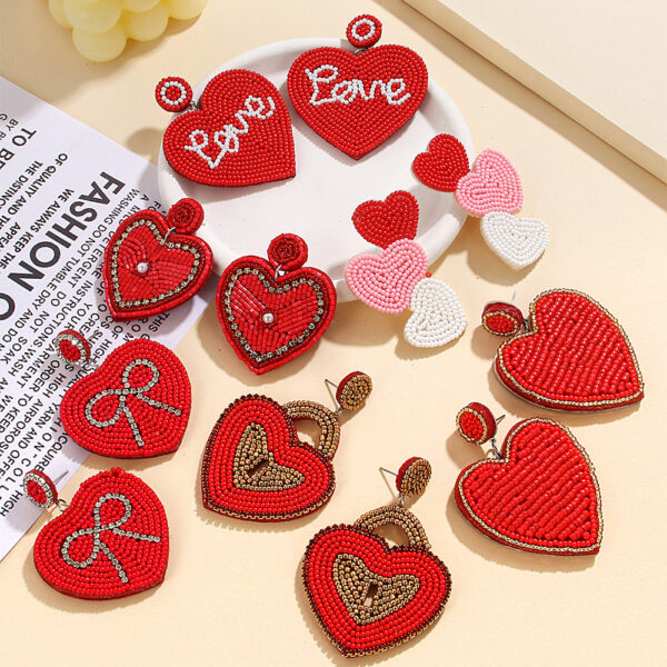 oly-c2e27e8fb0aac2c6311aa1d67fe241cf Wholesale fashion temperament handmade three heart rice beads irregular earrings earrings Valentine's Day