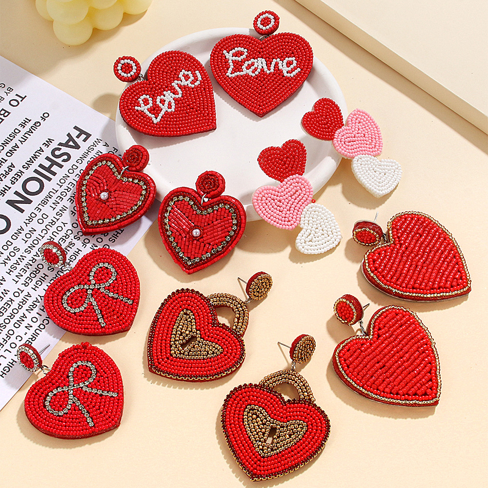 Wholesale Europe and the United States cross-border new fashion temperament handmade three heart rice beads irregular earrings earrings Valentine's Da