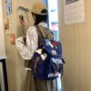 oly-c38efd8f8a95a4d0eac72faeb1eb0ec2 Wholesale Style Versatile Backpack for Middle and High School Students, College Students, Textured Commuter Large-Capacity Backpack, Women's Air Cushion Strap