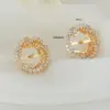 Wholesale Flowers Earrings With Bezel Setting In Copper And 14K Real Gold Plated, Featuring Zircon And 925 Sterling Silver Ear Pins
