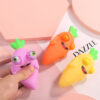 Wholesale Creative explosions squinting carrot decompression pinch music squeeze eye trick decompression vent fruit toys