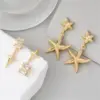 Wholesale Asymmetrical Star Earrings For Women In Silver Featuring Copper Ear Pins And Zircon Inlay