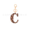 oly-c48ffbe02370a3ddb4c4199a604836bc Wholesale Acrylic leopard print letter keychain 26 letters complete creative fashion jewelry transparent pendant gift