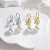 Wholesale French Retro Fashion Versatile Pearl Tassel Knotted Earrings Elegant Light Luxury Stainless Steel Earrings For Women Factory Direct Sale