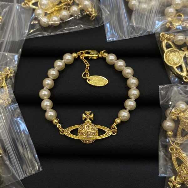 oly-c4f91178e7b3f19713df5af0e9e5a681 Wholesale Empress Dowager Saturn Bracelet High Version Classic Saturn Diamond Pearl Bracelet Light Luxury All-match Pearl Bracelet