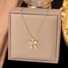 Wholesale Women’s Bow Tie Pendant Necklace With Inlay Artificial Rhinestones, 18K Real Gold Plated Copper, Water Plating On Cable Chain