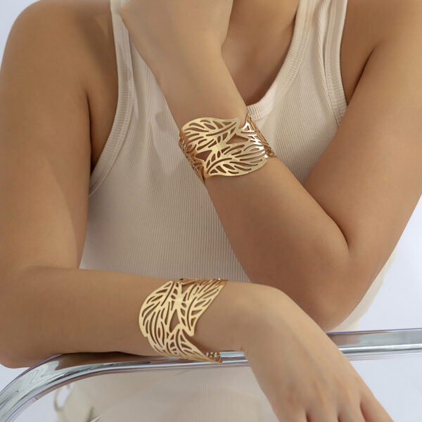 oly-c6db3c8662aee88b7bf394094cecf1be Wholesale jewelry French simple design sense open smooth bracelet niche retro hollow leaf bracelet