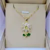 Wholesale 201 Stainless Steel Copper Flower Water Plating Vacuum Plating Zircon 18K Gold Plated 18K Gold Simple Style Coffee Bean Chain Transparent Gold Pendant Necklace