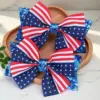 oly-c81b91a5f64617440e3a68d7aa1769fb Wholesale Flagpole Bow Hair Clip Star Decoration Duckbill Clip Independence Day Hairpin Denim