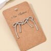 Wholesale 1 Pair Ig Metal Style Simple Spring and Summer Earrings Hollow Bow Women Commuter Earrings Earrings Stud