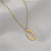 Wholesale Unisex Letter Pendant Necklace In Titanium Steel With Electroplated Gold Plating And Zircon Inlay