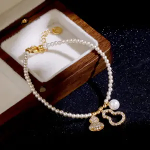 Wholesale Fashionable Luxury Pearl Bracelet Original Design Round Xiaomi Pearls Gourd Pendant Lucky Charm Safe Keeping Women's Bracelet