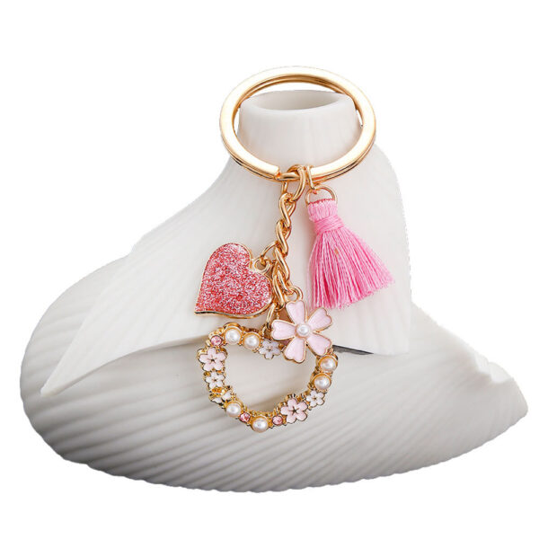 oly-c8f2bd2f9f3e3abf3d81d4df0b573c89 Wholesale AliExpress Explosions Beautiful Girl Heart Pink Tassel Pearl Flower Love Keychain Jewelry Luggage Pendant