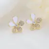 Wholesale Enamel Flowers Stud Earrings In Copper With 14K Real Gold Plated And Rhinestones, Featuring 925 Sterling Silver Ear Pins