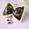 oly-c986c102d0935e51ebe9d5de00b94895 Wholesale Ins Accessible Luxury Leopard Print Leather Cotton-Filled Bow Heart Keychain Niche Design Sexy Sweet and Cool Mobile Phone Chain