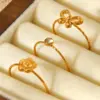 Wholesale 304 Stainless Steel Flower Bow Knot PVD Coated Zircon 18K Gold 18K Real Gold Plated IG Style Simple Style Waterproof Non Tarnish Inlay Gold Open Rings