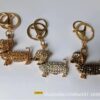 oly-ca69c3e1a681aff0712932bb51ea392a Wholesale puppy keychain cute pet explosion keychain