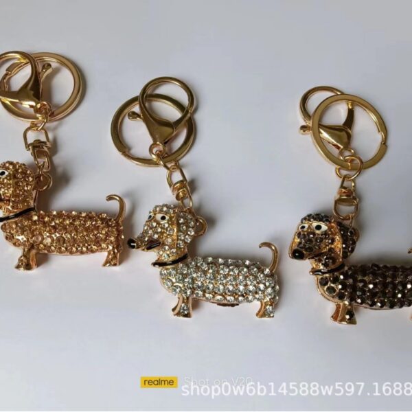 oly-ca69c3e1a681aff0712932bb51ea392a Wholesale puppy keychain cute pet explosion keychain