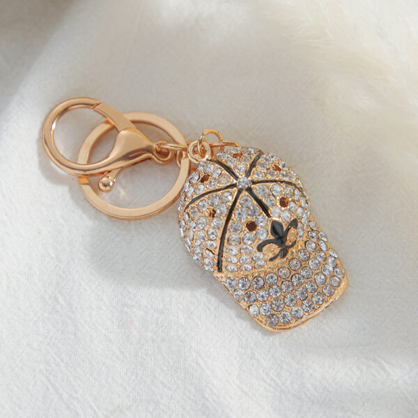 oly-ca9a741ce275ba9fd7075769ab44f2a6 Wholesale cute hat key chain wholesale diamond cartoon baseball cap metal key pendant ornaments small merchandise