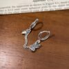 oly-cb5915c186f6d656b46f9034376b44f4 Wholesale s925 sterling silver rabbit carrot single conjoined ear bone double ear hole earrings female minority design sense ear buckle