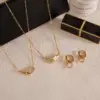 Wholesale Women's Classic Style 18K Gold 304 Stainless Steel + White Rhinestone Double Ring Necklace Earring Set 18K Real Gold Plated Vacuum Electroplating (In Furnace) Zircon Geometric Pattern (Jewelry) Waterproof Non-Fading Asymmetric Handmade Chain Jewelry Set For Women