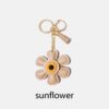 oly-cc693cc2c95a9f4ad73780eeef22ed7b Wholesale Sunflower Cute Cartoon Keychain Personality Ins Bag Pendant Key Chain Hanging Enamel Creative Gift