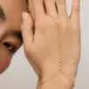 Wholesale Fashionable Titanium Steel 18K Gold Plated Bracelet With Diamond Small Round Piece Color Retention Women Stainless Steel Finger Clip Bead Finger Chain Vacuum Electroplating 18K Gold Retention