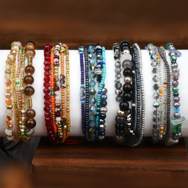 oly-ce812ed039fc1b4f843b8fcb06ff0d0a Wholesale Bohemian multi-layer natural gravel crystal beaded bracelet female minority high-end hand woven hand rope