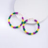 Wholesale color woven alloy handmade rice beads earrings  trend Carnival design sense earrings