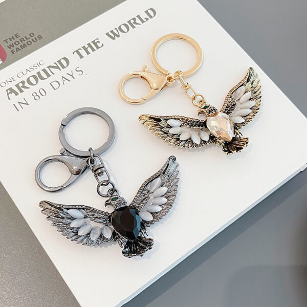 oly-cecc4836bceae42955c18348e9724634 Wholesale creative Opal eagle wing retro key chain car key chain accessories decoration key pendant