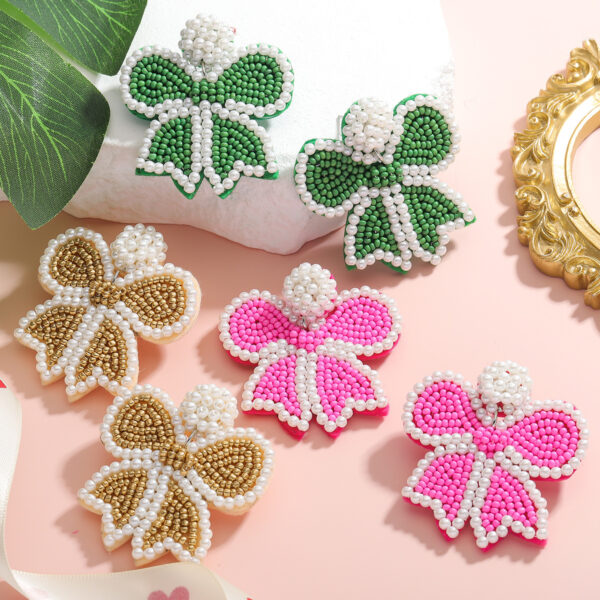 oly-cf850329a77d492bf896139bb7fe21c8 Wholesale Bow Earrings Best-Selling Rice Bead Earrings Sweet and Cute Creative Personalized Butterfly Earrings