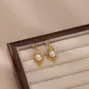 Wholesale Round Waterproof Non Tarnish Stud Earrings For Women In Copper With 18K Real Gold Plated PVD Coating And Artificial Pearl Inlay