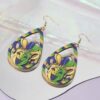 oly-d03761ef11ebaf2901fe8a6c056a4b77 Wholesale 1 Pair Ladies Cross Border Carnival Drop Type Croheart Mask Lightweight Wooden Earrings