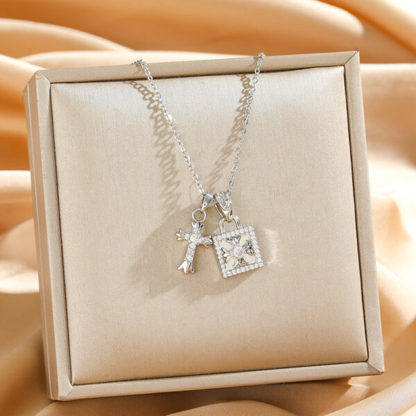 Wholesale Cross-shaped titanium steel necklace with square clasp, exuding a luxurious and versatile vibe, perfect for clavicle chain.