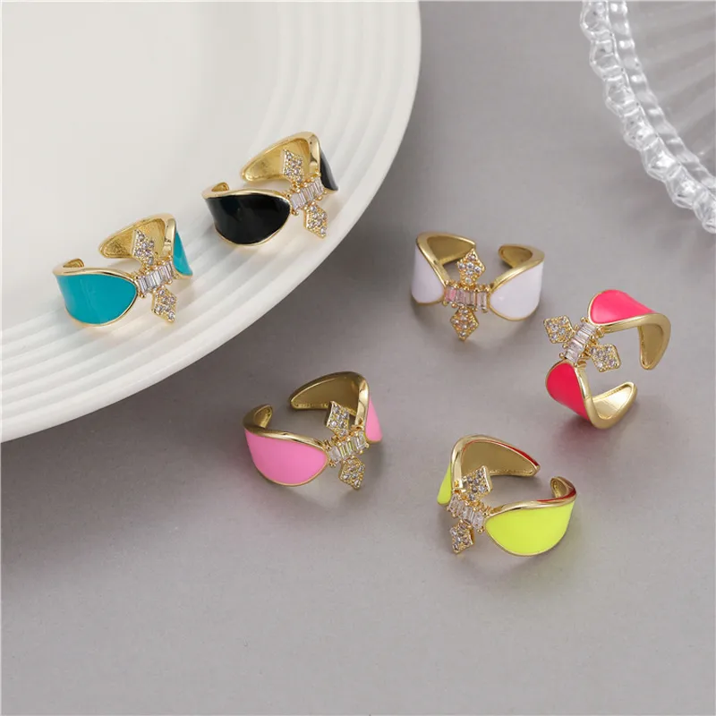 Wholesale Women’s Bow Tie Open Rings Featuring Enamel Craft And Zircon Inlay, Electroplated Copper Material