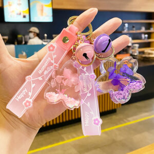 Wholesale Quicksand bottle key chain exquisite women's book bag pendant children's pendant small jewelry cute women's hanging chain decorative pendant