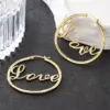 Wholesale Three-dimensional Love Earrings For Women In Copper With KC Golden Water Plating And 0.03µm Thickness