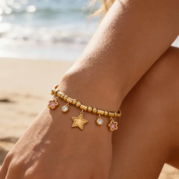 oly-d23825a7dccb407471dbf128f01f242e Wholesale Star Waterproof Couple Bracelets In 304 Stainless Steel With 18K Gold Plated Finish And Zircon Inlay On Snake Chain