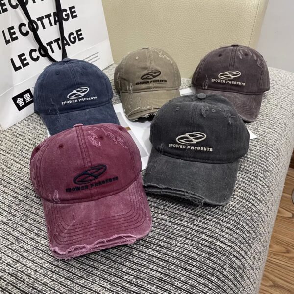 oly-d2a0f74e412319e7cd611dfe2f71600c Wholesale style letter embroidery ripped distressed all-match baseball cap Women's fashionable sun-proof sun-proof western style peaked cap