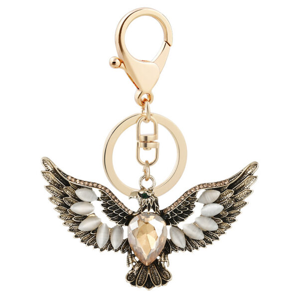 oly-d2cadf771648ed6b4642c0fc8c3dc596 Wholesale creative Opal eagle wing retro key chain car key chain accessories decoration key pendant