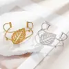 Wholesale 304 Stainless Steel Solid Color PVD Coated Natural Stone Titanium Steel 18K Gold Real Gold Plated Cute Modern Style Shiny Waterproof Non Tarnish Surgical Steel Bangle