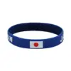 oly-d3e1206f879cee985b64a24badf43454 Wholesale Multicolor Nordic Style Asymmetrical National Flag Wristband In Silica Gel With Nylon Chain Material For Couples