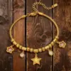 oly-d49e337d2cb2d55048505bbd66787deb Wholesale Star Waterproof Couple Bracelets In 304 Stainless Steel With 18K Gold Plated Finish And Zircon Inlay On Snake Chain