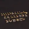 oly-d4dd77af30c215254f462105aa6cb3c8 Wholesale 316L Stainless Steel Copper Ear Cartilage Rings & Studs Flower Waterproof Non Tarnish Surgical Steel