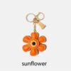 oly-d563f43f06bb58f21a943205cc207931 Wholesale Sunflower Cute Cartoon Keychain Personality Ins Bag Pendant Key Chain Hanging Enamel Creative Gift