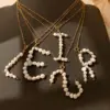 Wholesale 18K Gold Plated Titanium Steel Vacuum Electroplated Three-Dimensional Letter Pearl Trendy Necklace Handmade Unisex