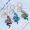 oly-d7446cec61bd58a97b4bbfd7baa76915 Wholesale Zodiac Diamond-embedded gradient snake keychain car bag pendant creative gifts for the year of birth