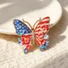 Wholesale Butterfly Pin In Red Zinc Alloy Featuring Diamond Craft, Perfect For Independence Day