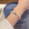 oly-d784d77391243f74e90675faeb21454b Wholesale Mermaid's tears navy blue sapphire artificial pearl beaded bracelet Year light luxury niche design bracelet